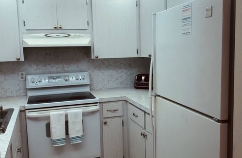 Woodlands Condo | 1 Bedroom 1 bath Waterfront Condo Our Tropical Getaway 2 pools and Public Beach