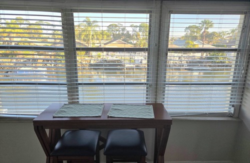 Woodlands Condo | 1 Bedroom 1 bath Waterfront Condo Our Tropical Getaway 2 pools and Public Beach