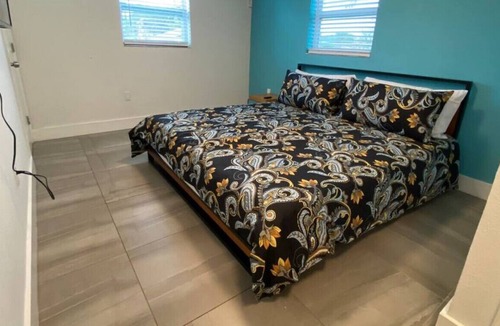Liberty City House | 1865 back/game room · Boho home with Game/Movie Room