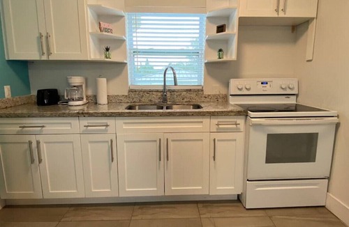 Liberty City House | 1865 back/game room · Boho home with Game/Movie Room