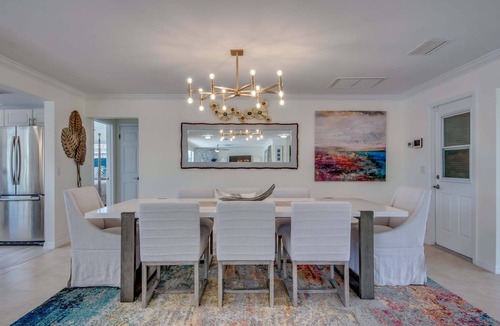 Caloosahatchee House | 2 Waterfront Villas, Dual Pools, Gulf Access & Tiki Hut Escape - Everlasting Paradise - Roelens
