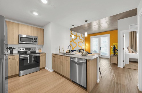 Lake Dot Apartment | 2BR Family Getaway, Rooftop Pool in Downtown Orlando!