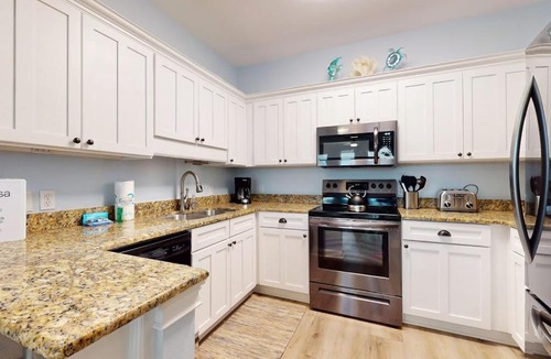 Dune Allen Beach House | 2nd floor condo near beach with balcony outdoor pool streaming & washer dryer