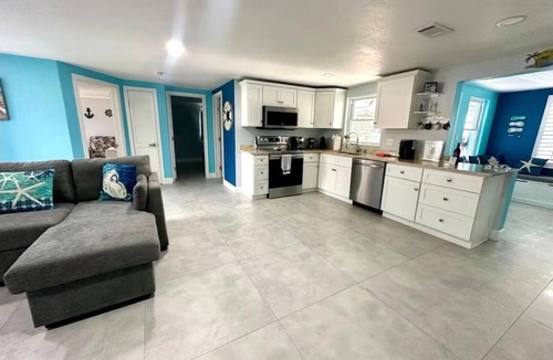 Hudson Beach Estates House | 3-bedroom house in soothing Hudson with waterfront and heated pool.
