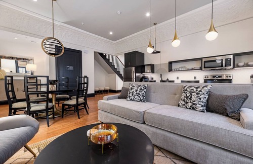 Central Business District Hotel | 4BR 2-Story Historic Space Steps from French Quarter | The Mayfair