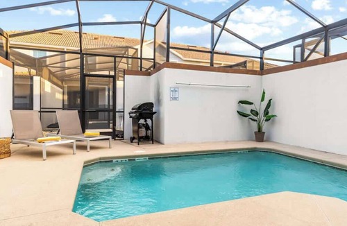 Kissimmee Condo | 4BR/Close to Disney/Free BBQ&Storey Lake WaterPark