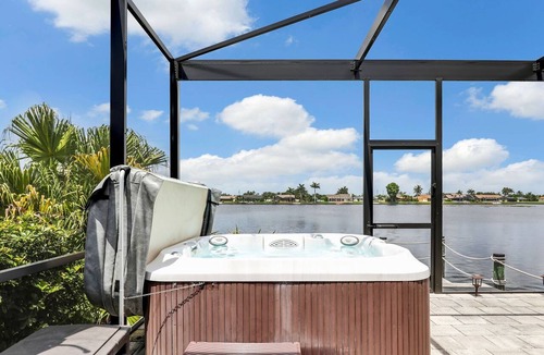 Pelican House | 80-ft Waterfront Resort-like Retreat to Relax; Heated Pool, Jacuzzi, Bikes, Pier