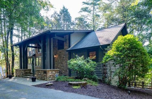 Cherry Log House | A Stoney River - Cherry Log, GA - Enjoy Scenic River Views, Soak in the Hot Tub, Challenge Friends in the Arcade, and Rack Up a