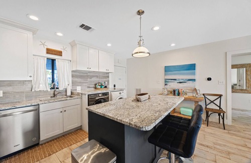 Holiday Isle House | Actually on the Beach! Private beach, 1 row umbrella max, Sleeps 8, huge balcony