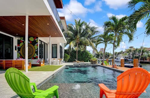 Coral Ridge House | Amazing waterfront 4 BR with Hot tub, Pool and gym