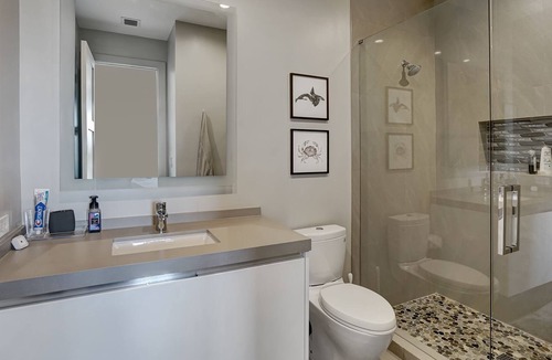 Coral Ridge House | Amazing waterfront 4 BR with Hot tub, Pool and gym
