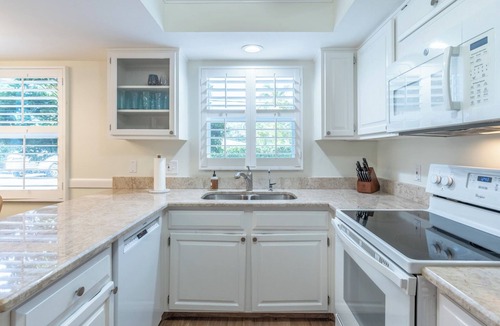Moorings Condo | Approx 1 mile to the beach! West of 41 condo with pool and hot tub!