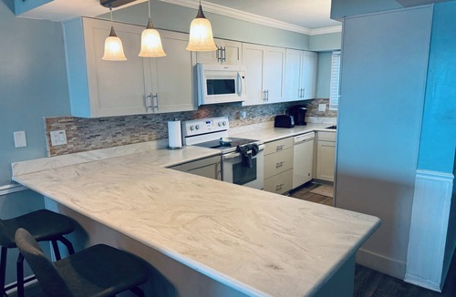 Biltmore Beach Condo | AWESOME LATE SUMMER DEAL:8/29-9/5=1250 Total!5star/Beachfront/FREE Beach Chairs!