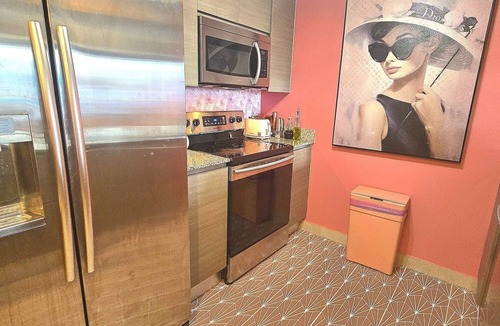 Town Square Condo | BarB&B A Pink Paradise Awaits