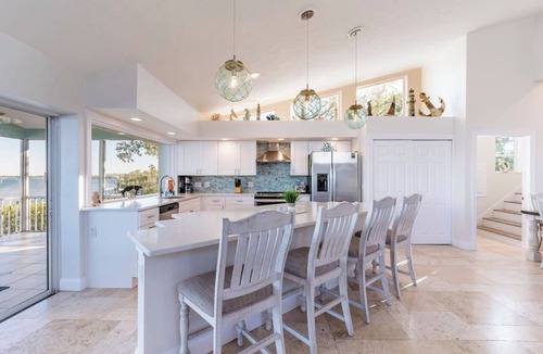 Whitney Beach House | Bay beauty with heated pool, spa, games, ping pong