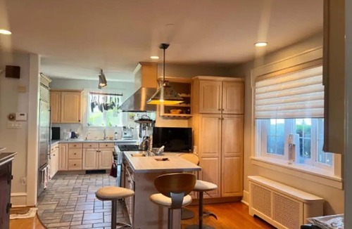 A-Zone House | Bayfront 6-bedroom home, sleeps 16 with AC, in-ground pool and spa. Dog friendly