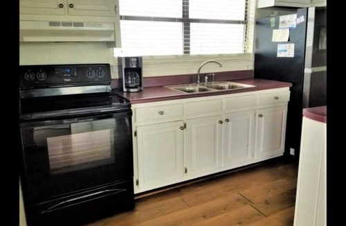 Fort Morgan Pines Cottage | Bayfront Gulf Shores Retreat Near Beach Dolphin Views Sleeps 11