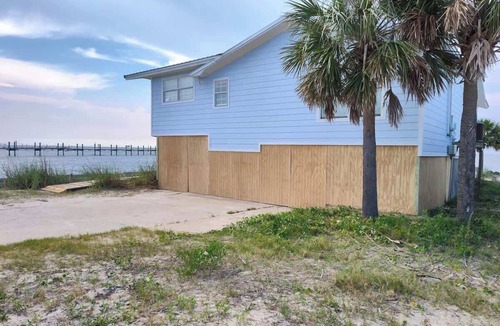Fort Morgan Pines Cottage | Bayfront Gulf Shores Retreat Near Beach Dolphin Views Sleeps 11