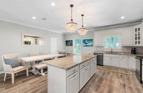 Pass Chateau Harbor House | Bayfront home with excellent view of the D.I. Bridge