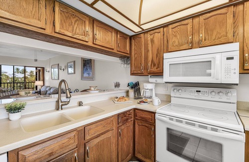 Mid Island Condo | Bayview Bliss Near the Beach with Resort Amenities & Sunroom - Serenity by the Shore