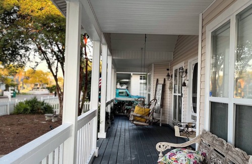 Clipper Cove Cottage | BEACH COTTAGE 3BR , GOLF CART W/HOUSE, PORCH SWING ,POOL 30 STEPS AWAY, PETS LOV