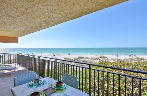 Holmes Beach Condo | Beach Oasis! Beachfront Condo with Unforgettable Sunsets, Heated Pool, WiFi