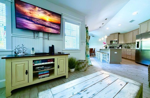 Holmes Beach House | Beach Time AMI! Pet Friendly Home with Pool, Hot Tub and Walk to Beach