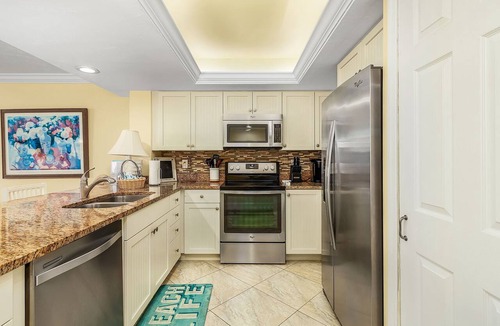 Punta Rassa Condo | Beachfront Stunning Corner Condo- Amazing Water views on Private Beach of Resort