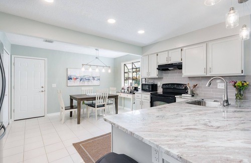 Golden Glades - The Woods House | Beautiful 4 Bedroom Lake Home just minutes from Beaches and Mayo!