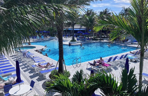 Fort Pierce Condo | Beautiful Clean Condo, private veranda, steps from private beach and pool