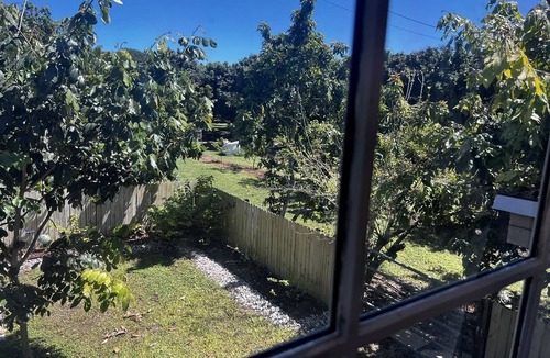 Homestead Cottage | Beautiful Red Cottage for a Relaxing Getaway on a Tropical Fruit Farm near Homestead, Florida