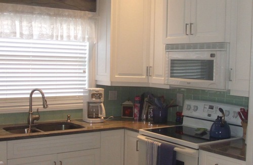 Naples Park House | Beautiful Refurbished Saltwater Pool. One-half mile walk to Vanderbilt Beach