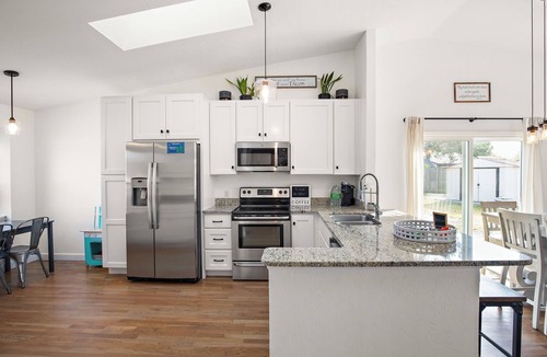 Port Orange House | Beautiful summer open concept house that feels like home away from home, exceptionally clean with a great outdoor space and fire pit!