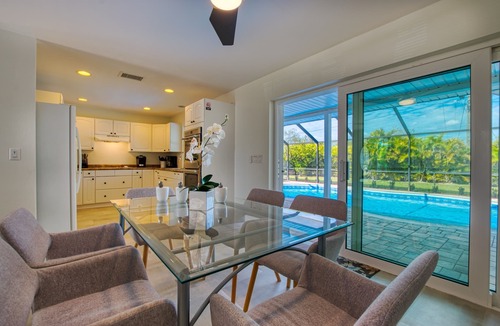 Caloosahatchee House | Beautiful villa in a prime location with large heated pool.