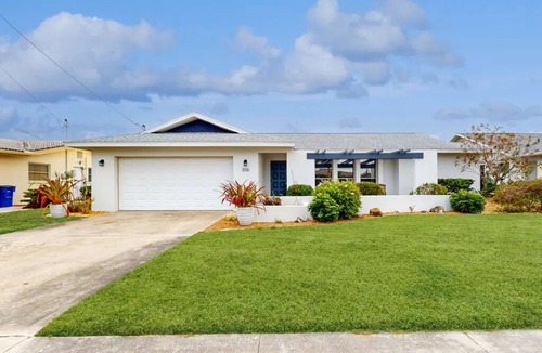 Lochmoor Waterway Estates House | Beautiful Waterfront Home with Heated Pool in Quiet Neighborhood