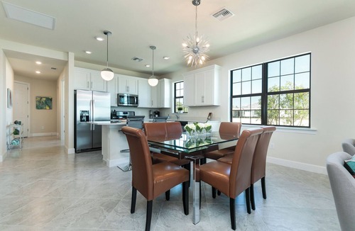Biggar Villa | Beautiful Waterfront Villa in Popular Gated Retreat. Full Resort Amenities.
