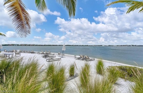 Biggar Villa | Beautiful Waterfront Villa in Popular Gated Retreat. Full Resort Amenities.