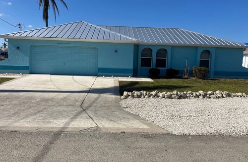 Matlacha House | Beautiful waterfront home, new refinished heated pool, boat dock bikes & kayaks!