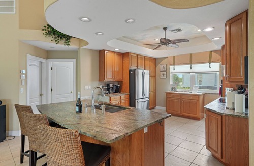 Pelican House | Beautifully maintained 4 bed/2 bath on canal w/pool & sailboat access