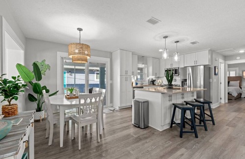Riviera Beach House | Blue Tide Hideaway ~ Pet-Friendly Home with Golf Cart & Hot Tub