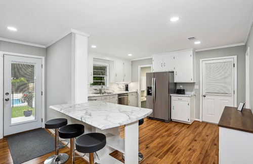 Northeast Pensacola House | Brand New Private Pool | Huge Open Lot |Corn Hole and Volleyball |Convenient to Airport and Shopping
