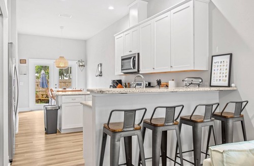 Pleasant Street House | Breezy Blue Bungalow in Heart of Pleasant Street