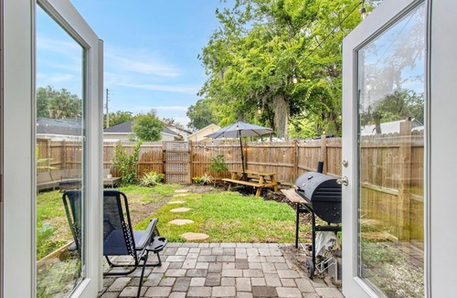 Pleasant Street House | Breezy Blue Bungalow in Heart of Pleasant Street