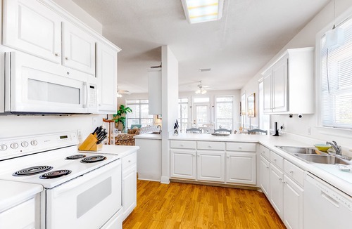 Audubon Place House | Bright duplex with two full kitchens, large decks, and private washer/dryers