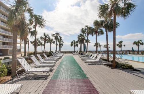 Gulf Lagoon Beach House | Bright waterfront condo in a gated resort with pools tennis courts & gym