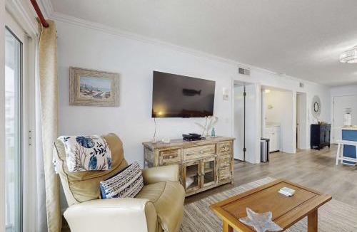 Fort Morgan House | Casual condo steps from the beach with AC balcony resort pools & free WiFi