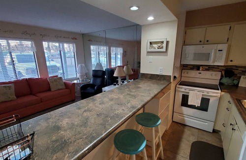 Holiday Beach Condo | Charming 1Br Condo on the beach with pool outside back door and beach access.