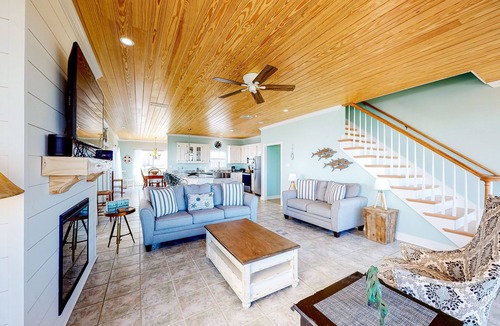 Dauphin Island House | Charming bay-front home with WiFi, spacious wraparound porch, private deck