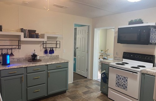 Gulfport Cottage | Charming Cottage in Gulfport overlooking 2 beautiful ponds WIFI Pet Friendly