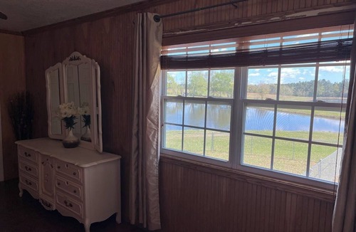 Gulfport Cottage | Charming Cottage in Gulfport overlooking 2 beautiful ponds WIFI Pet Friendly